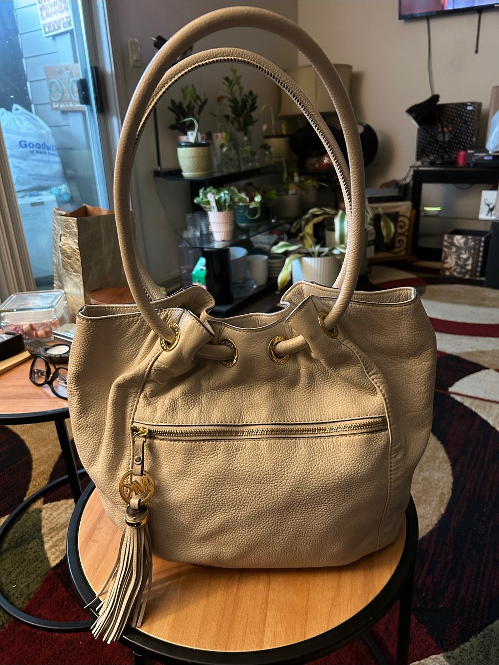 Michael Kors Beige Pebble Leather Drawstring Shoulder Bag with Tassel Charm